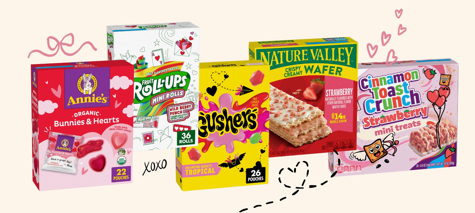 ​​Valentine’s Day snacks and treats like Gusher’s Valentine’s Tropical Variety on a pink background with heart doodles. 